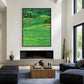 Emerald Fairways artwork displayed above a fireplace between tall windows.