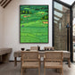 Emerald Fairways artwork displayed above a light wood dining table.