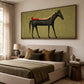 Scarlet Boot Siesta artwork displayed above a bed with olive bedding.