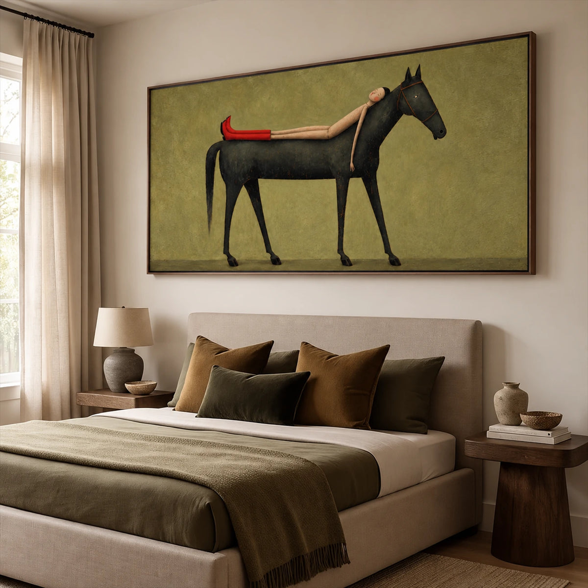 Scarlet Boot Siesta artwork displayed above a bed with olive bedding.