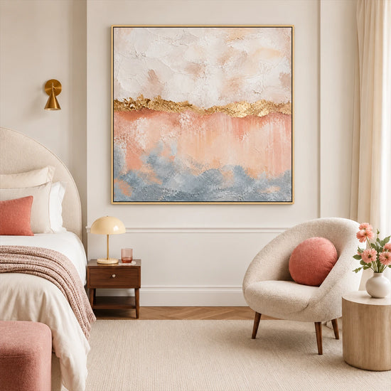 Gilded Blush artwork displayed beside a bed with soft pink bedding.