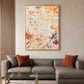Amber Traces artwork displayed above a gray sofa beside vertical wood panels.