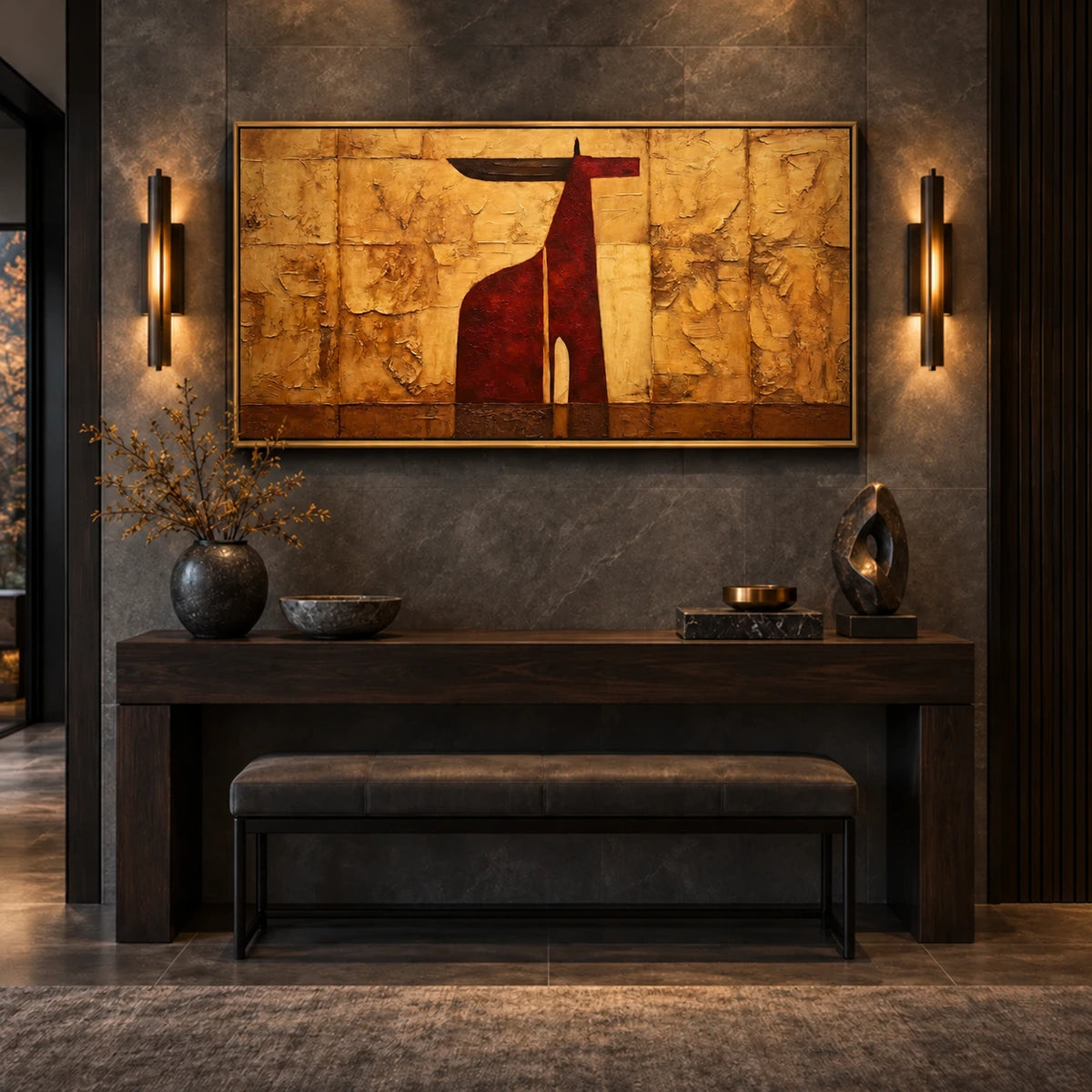 Ochre Longhorn artwork displayed above a console between wall sconces.