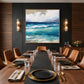Azure Breakers artwork displayed above a dining table and leather chairs.