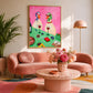 Bistro Ducks artwork displayed above a curved pink sofa with a round coffee table.