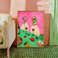 Bistro Ducks artwork displayed leaning beside a cream chair and green doorway.