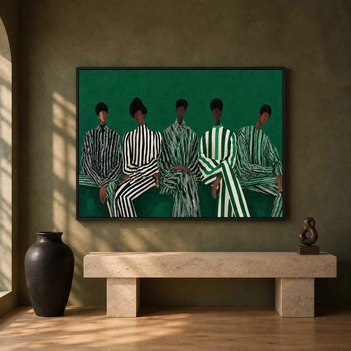 Emerald Assembly artwork displayed above a stone bench against an olive wall.