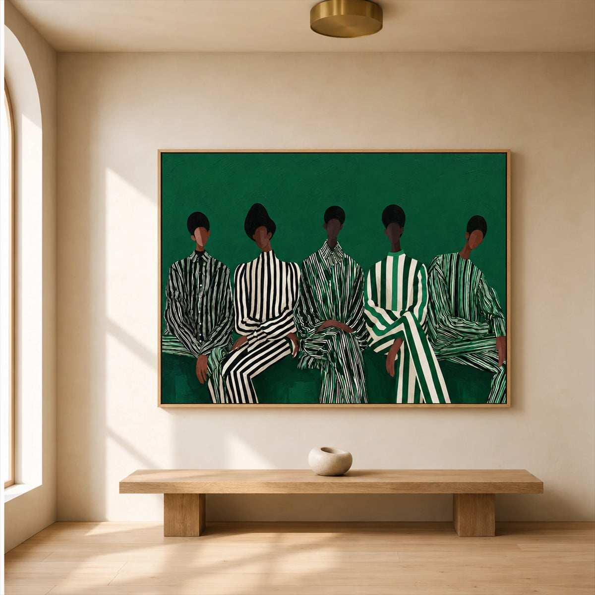 Emerald Assembly artwork displayed above a pale wooden bench.