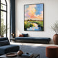 Pastel Estuary artwork displayed above a dark blue bench near an arched window.