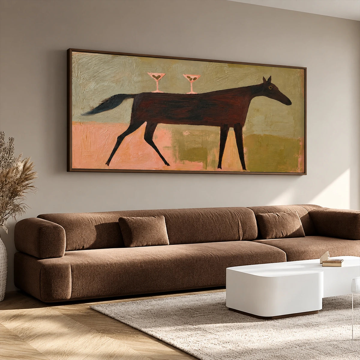 Twilight Trot artwork displayed above a brown sofa.