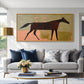 Twilight Trot artwork displayed above a pale sofa with blue cushions.