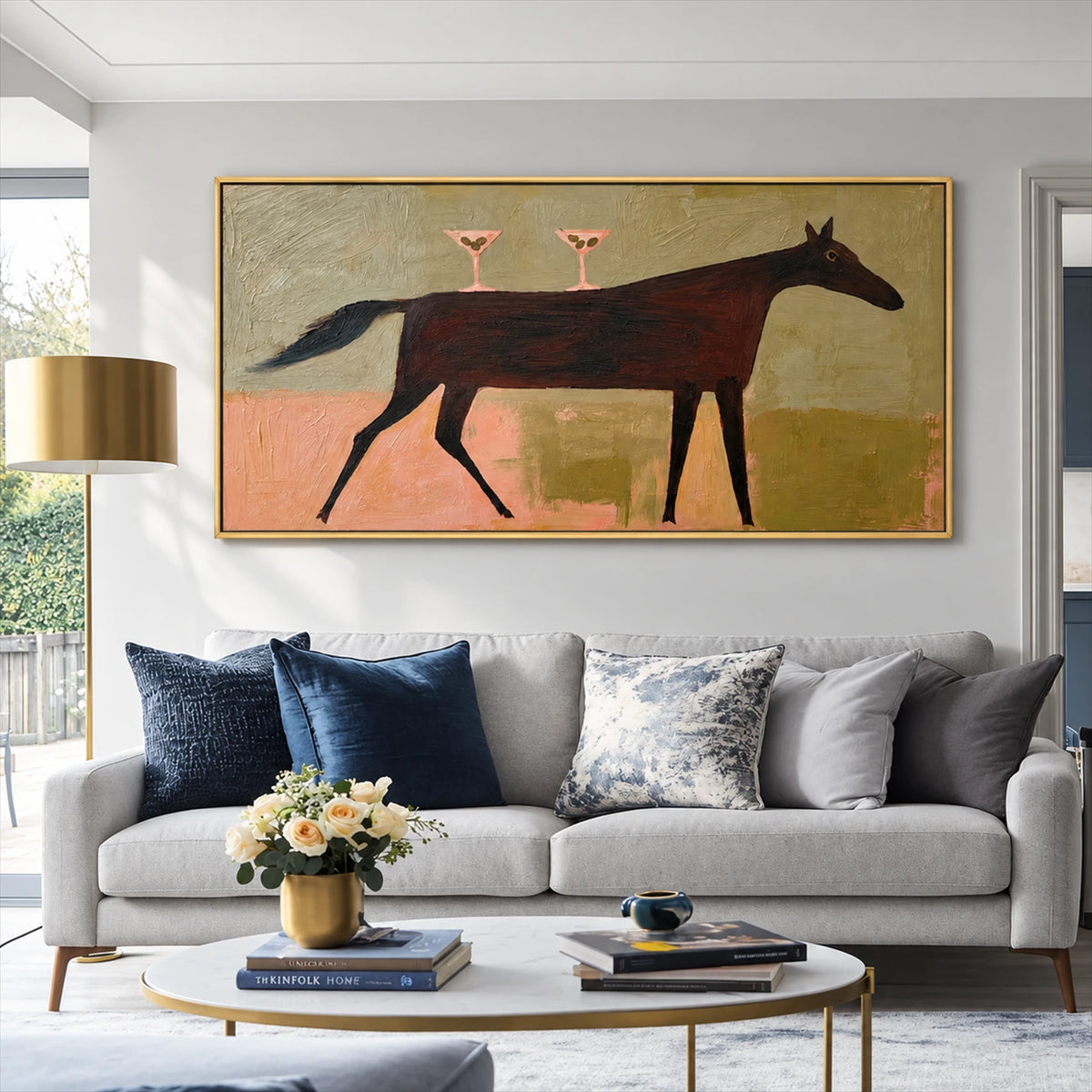 Twilight Trot artwork displayed above a pale sofa with blue cushions.