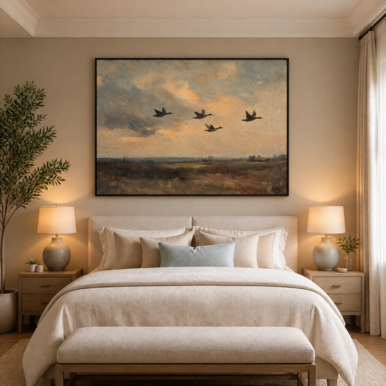 Duskbound Flight artwork displayed above a cream upholstered bed.