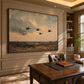 Duskbound Flight artwork displayed above a wooden desk in a paneled office.