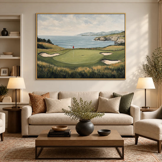 Coastal Green artwork displayed above a cream sofa beside shelving.