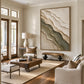Quiet Strata artwork displayed above a wooden bench in a bright living room.