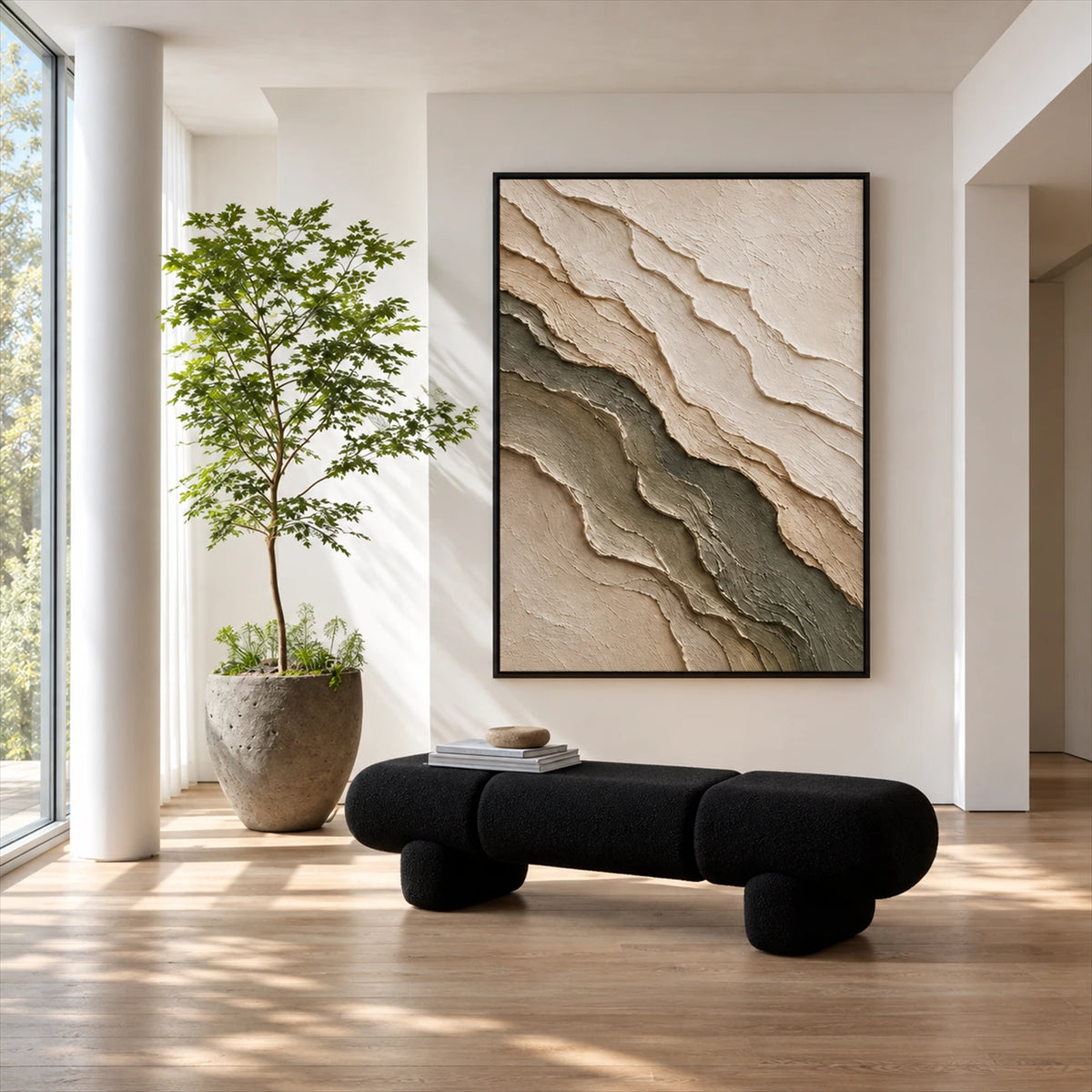 Quiet Strata artwork displayed above a black sculptural bench.