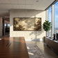 Clouded Canopy artwork displayed on a bright office wall.