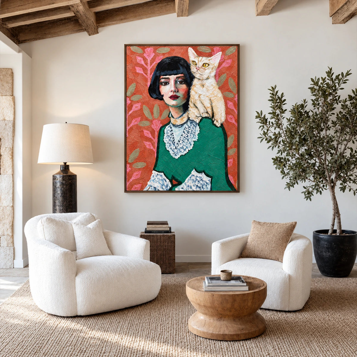 Feline Muse artwork displayed above rounded white armchairs.