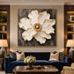 Ivory Radiance artwork displayed above a navy sofa between shelves.