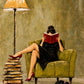 Chapter Hour full artwork. A reader relaxes in a green armchair with a red book, a tall stack of volumes nearby and a small cat below.