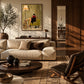 Chapter Hour artwork displayed above a console behind a cream sofa.