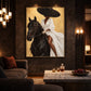 Noir Rein artwork displayed above a low coffee table in a dark lounge.