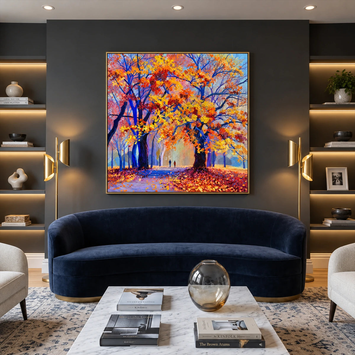 Cobalt Autumn artwork displayed above a dark blue curved sofa.