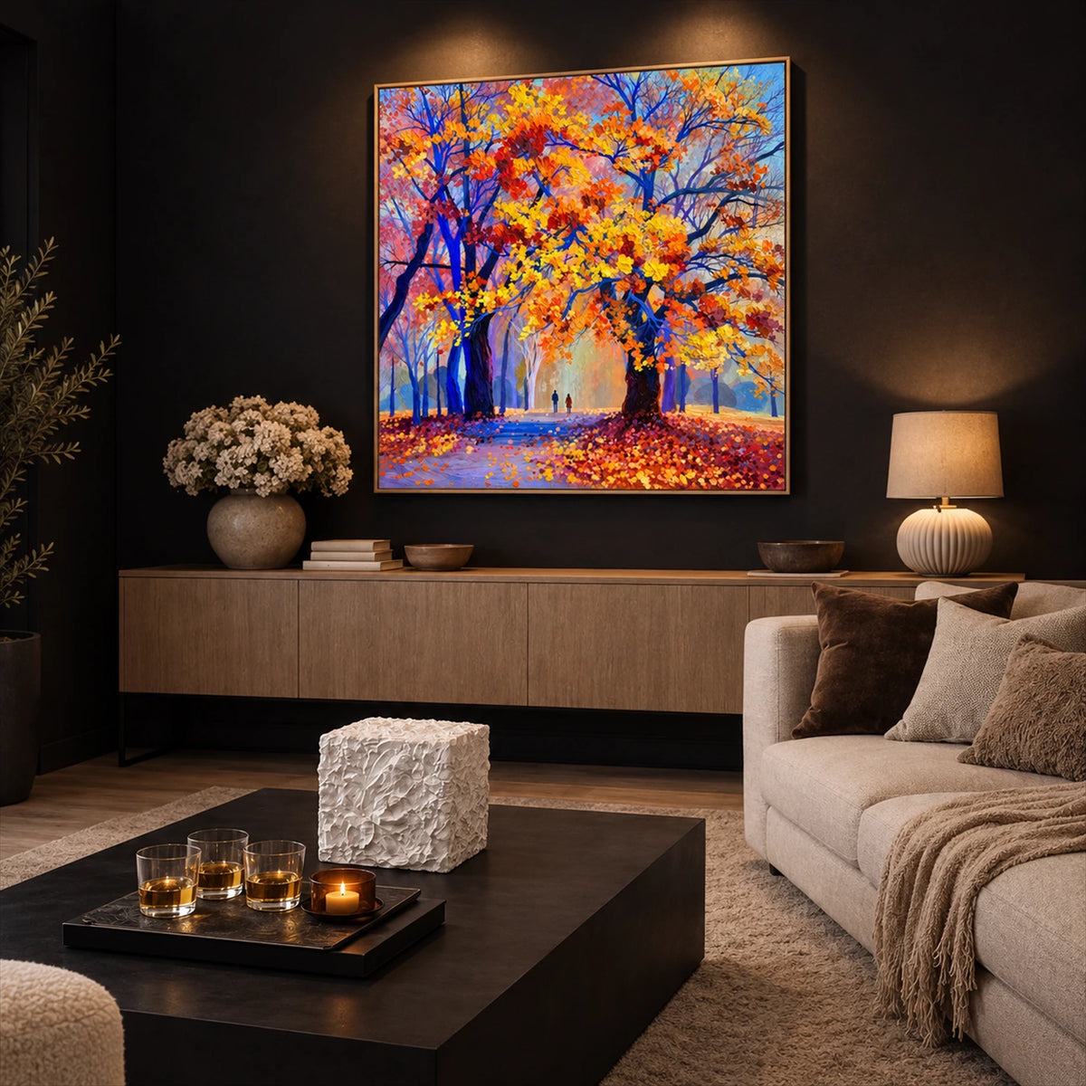 Cobalt Autumn artwork displayed above a wooden sideboard behind lounge seating.