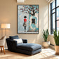 Birdsong Courtyard artwork displayed above a blue chaise beside plants.