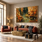 Autumn Herons artwork displayed above an orange sofa beside a reading chair.