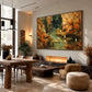 Autumn Herons artwork displayed above a fireplace beside dining and lounge furniture.