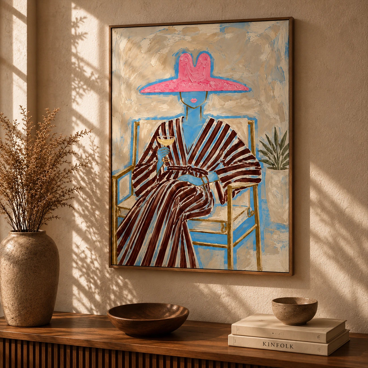 Rosy Brim artwork displayed above a ribbed console with ceramic bowls.