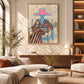 Rosy Brim artwork displayed above a long cabinet behind lounge seating.