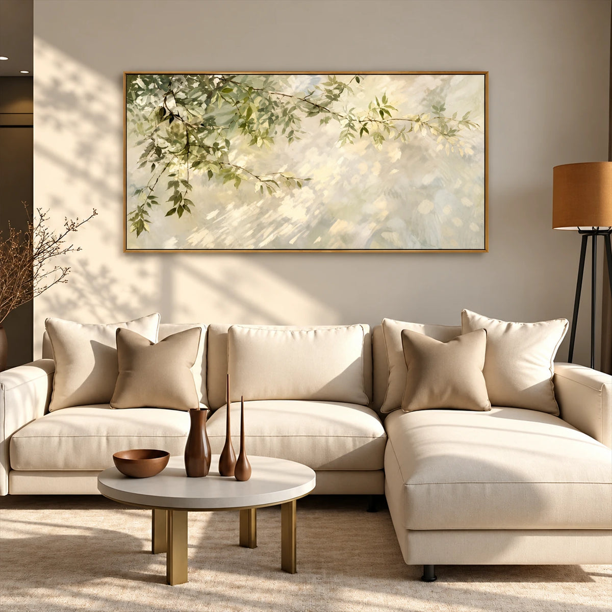 Dappled Branches artwork displayed above a cream sectional.
