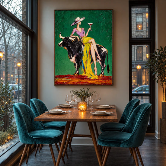 Emerald Toast artwork displayed above a dining table with teal chairs.