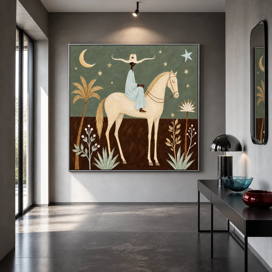Celestial Saddle artwork displayed above a low white cabinet.