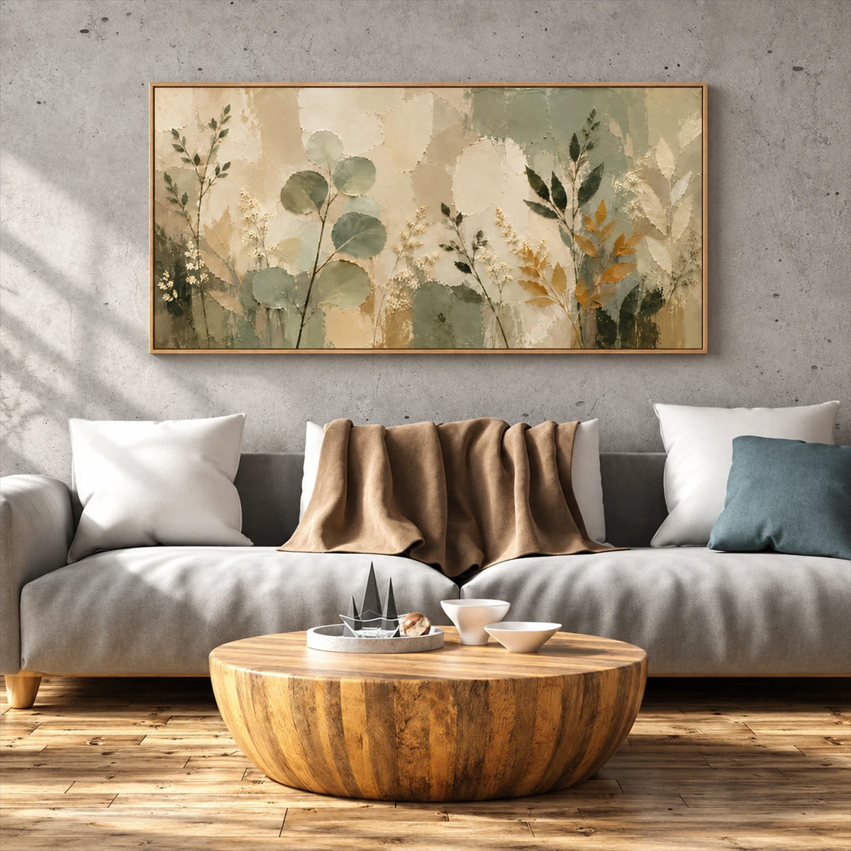 Sage Herbarium artwork displayed above a white sofa and round wooden table.