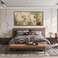 Sage Herbarium artwork displayed above a brown upholstered headboard.