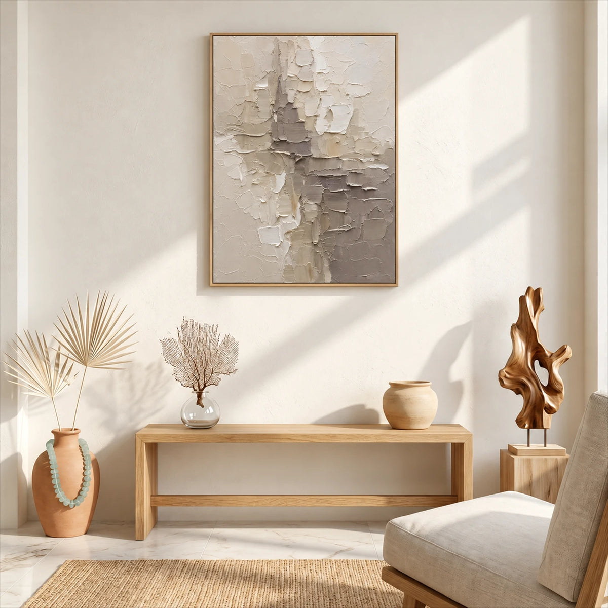 Ivory Fragments artwork displayed above a wooden console with ceramics.