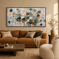 Eucalyptus Drift artwork displayed above a brown sofa.