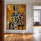 Spotted Silhouette artwork displayed on a white paneled hallway wall.