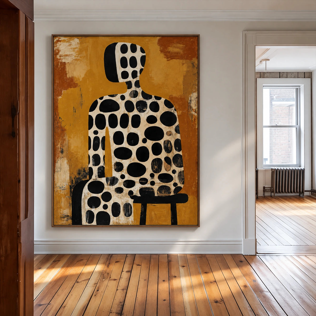 Spotted Silhouette artwork displayed on a white paneled hallway wall.