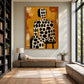 Spotted Silhouette artwork displayed above a bench between bookshelves.