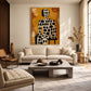 Spotted Silhouette artwork displayed above a cream sofa.