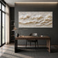 Ivory Tidemarks artwork displayed above a wooden desk against a dark wall.