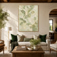 Tender Foliage artwork displayed above a cream sofa with green cushions.