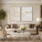 Ivory Confluence two-panel artwork set displayed above a cream sofa and pale coffee table.