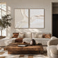 Ivory Confluence two-panel artwork set displayed above a cream sofa and rustic coffee table.