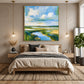 Marshlight Bend artwork displayed above a bed between pendant lights.